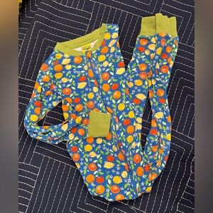 DUNS Sweden "zip suit" one-piece pajamas in bright citrus print, size 10 years